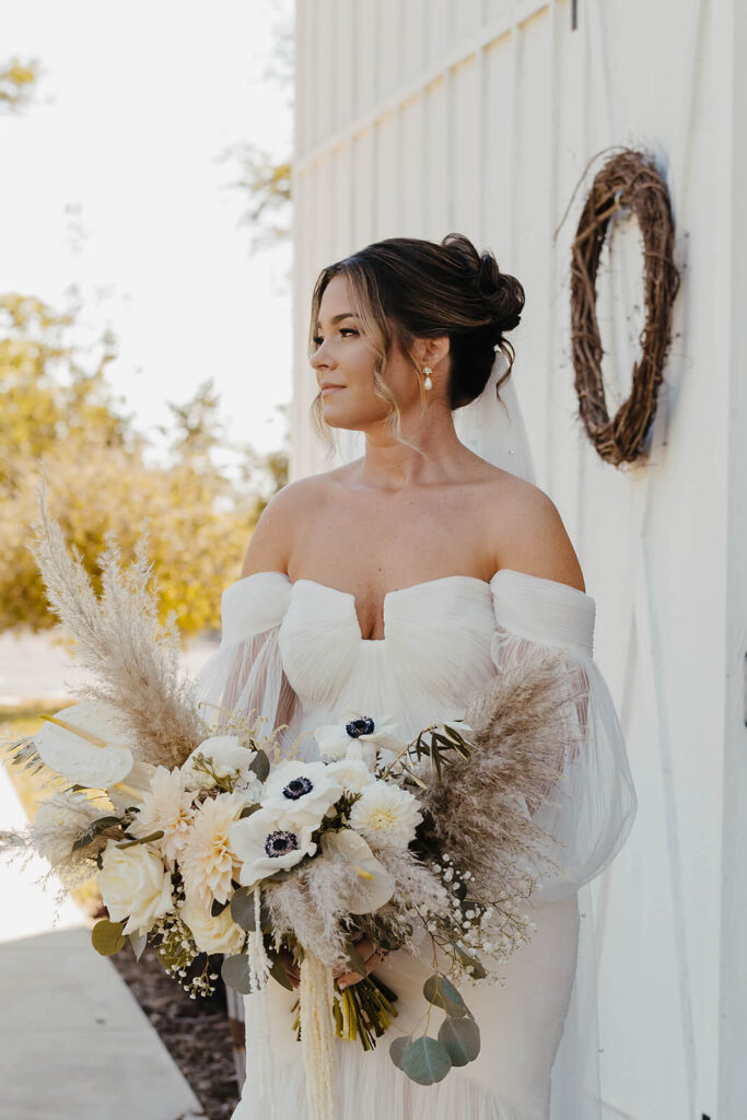 bridal portrait holding boho bouquet by event coordinator madison wi