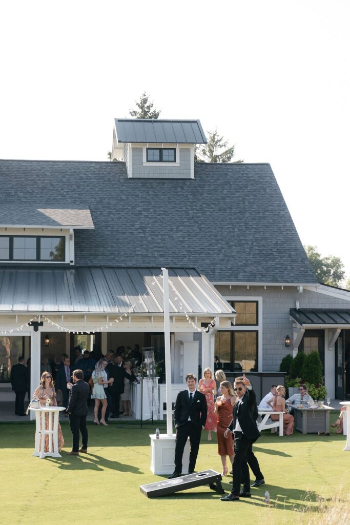 guests playing lawn games at outdoor wedding venue in Milwaukee