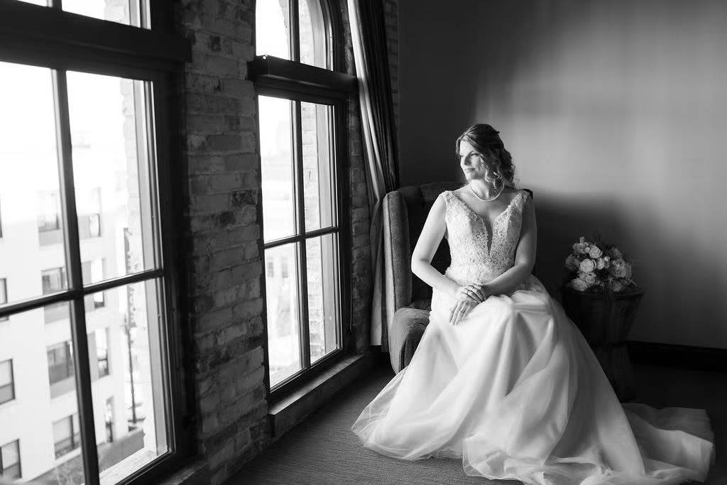 Bride over looking indoor wedding venue in historic ceremony location