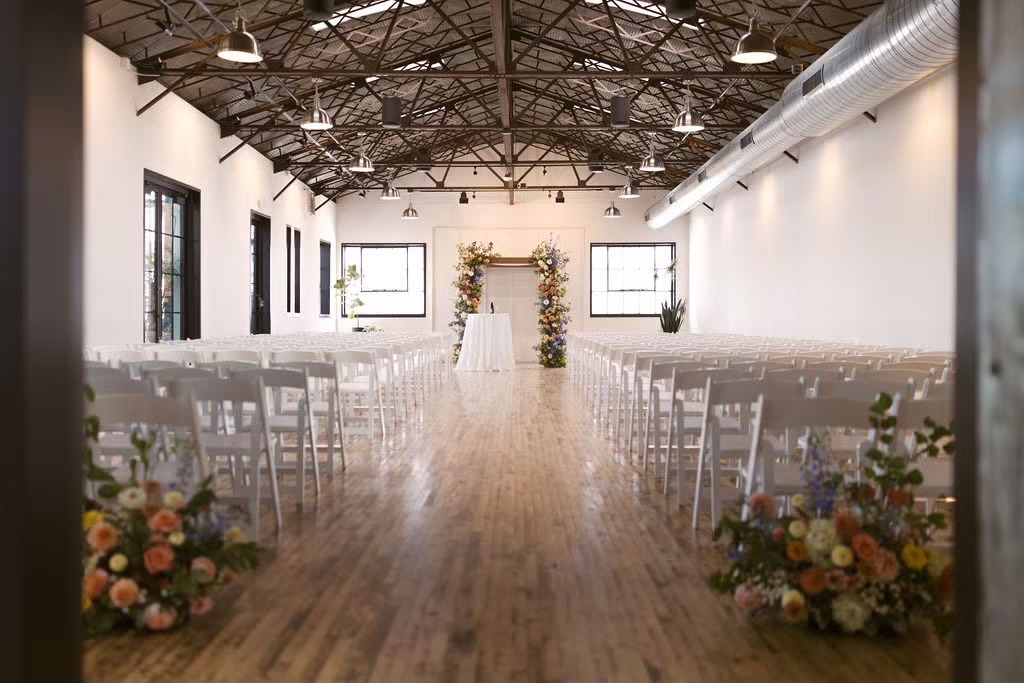 Indoor wedding venue empty with floral decor
