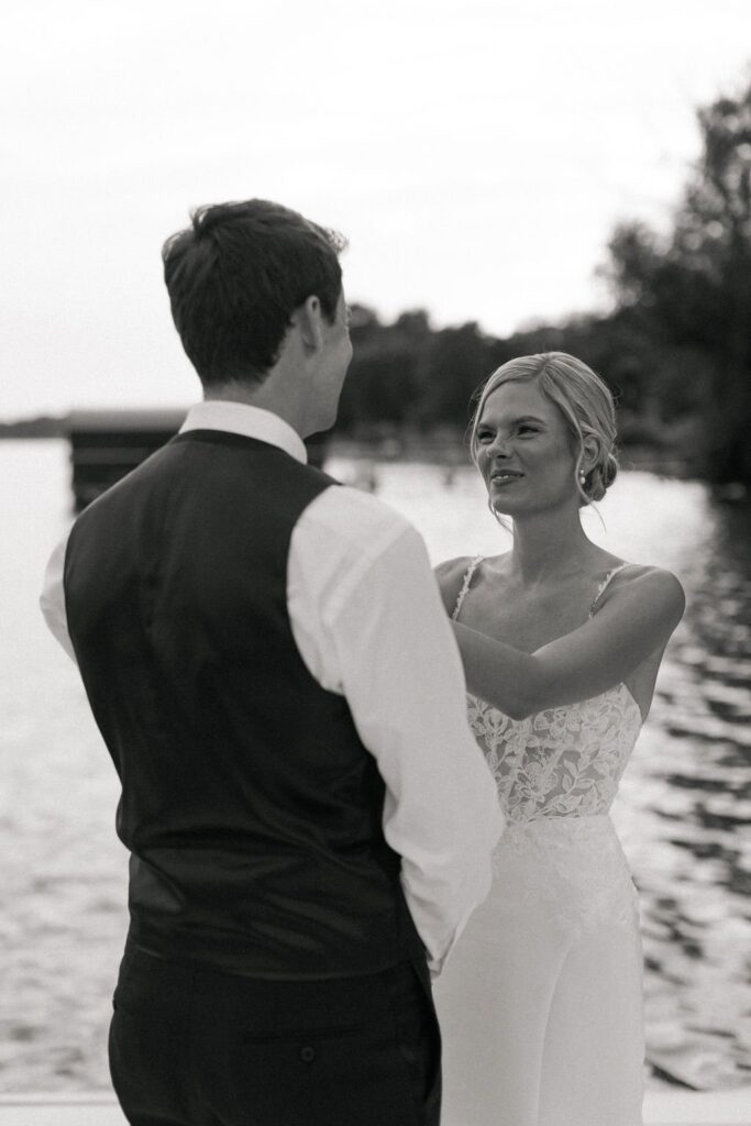 bride and groom during their prtrait shoot next to lake geneva at their lake geneva wedding location