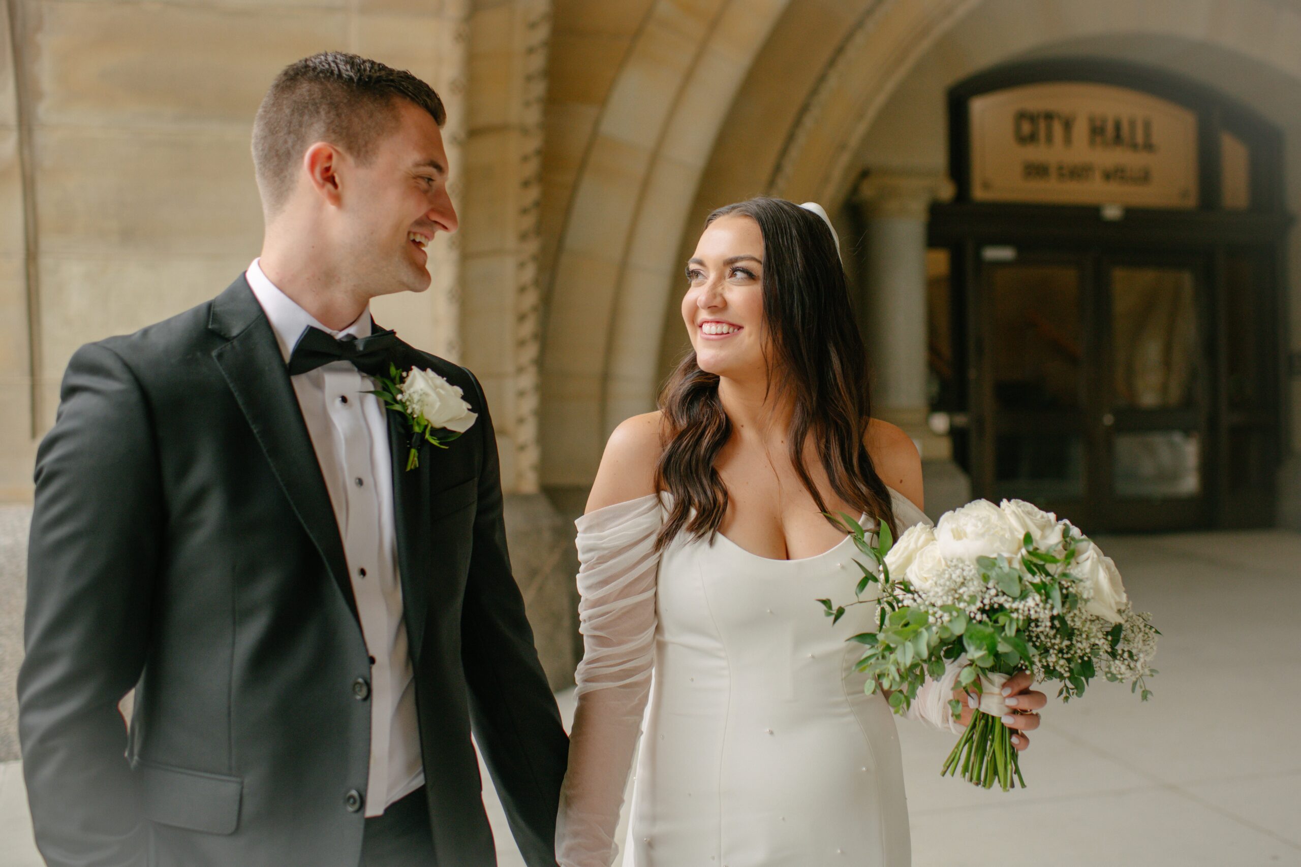 bride and groom lovingly staring at each other during their couples photos at their lake geneva wedding