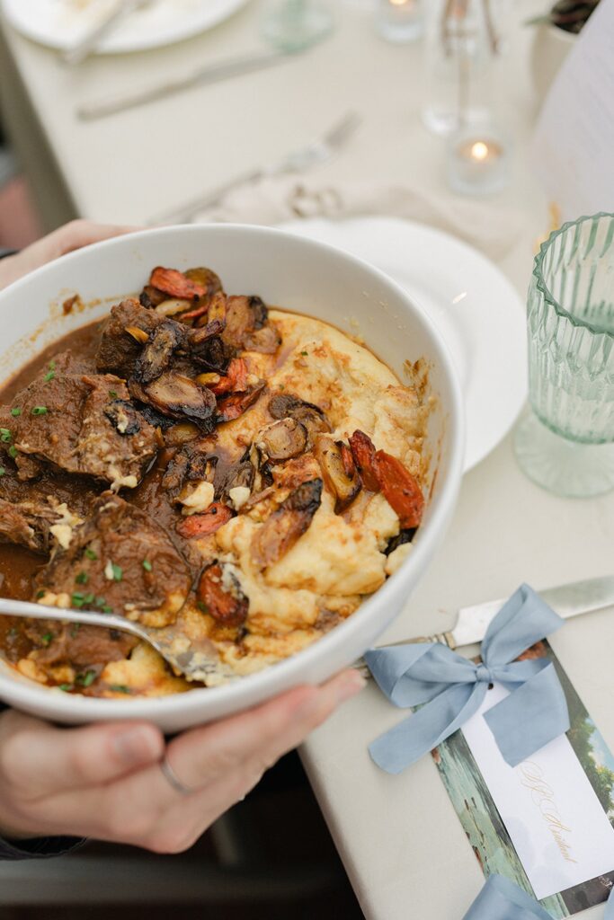 Close-up of a hearty wedding reception entrée with braised beef and creamy mashed potatoes served at a Madison WI wedding venue reception