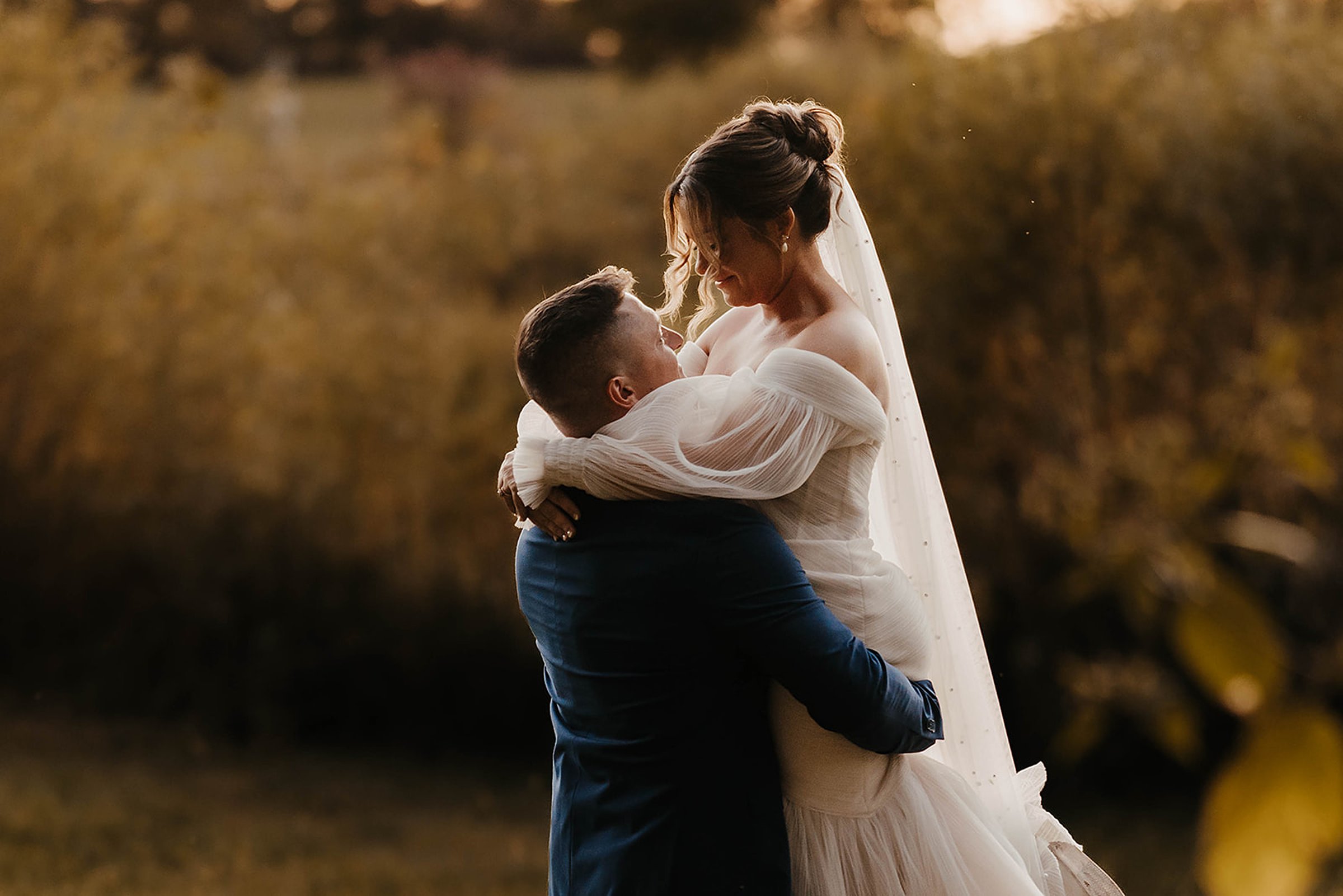 Romantic sunset wedding portrait of a couple celebrating their Madison wedding day